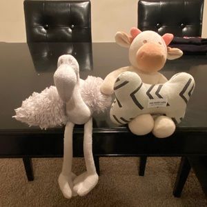 3 dog toys! Flamingo, bone and cow.